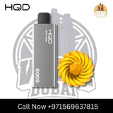 Black HQD 6000 Puffs vape with ice cubes, blackberries, and flavor options.